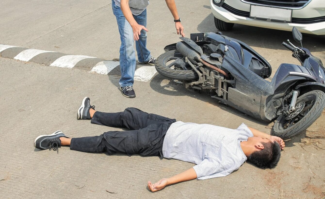 Photograph of a motorcycle crash investigation on a Gretna roadway