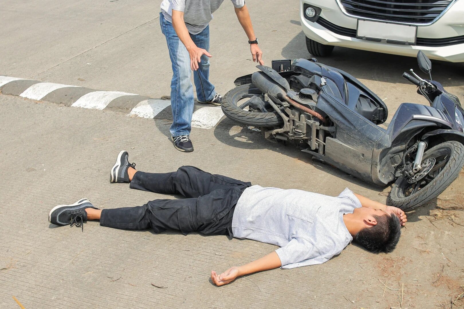 Photograph of a motorcycle crash investigation on a Gretna roadway